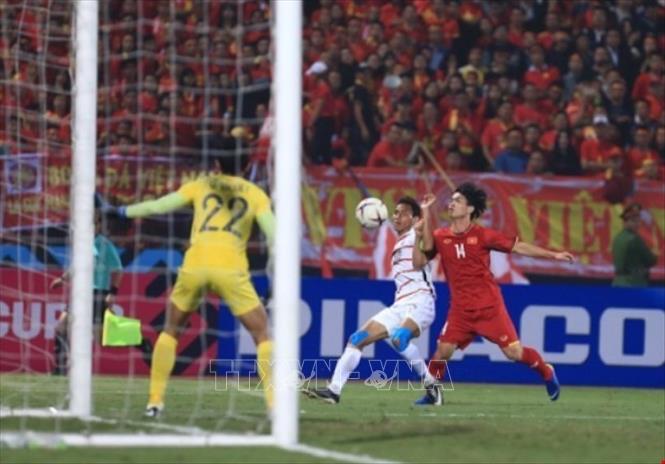 Trong ảnh: Một pha băng xuống của tiền đạo Công Phượng. Ảnh: Trọng Đạt - TTXVN