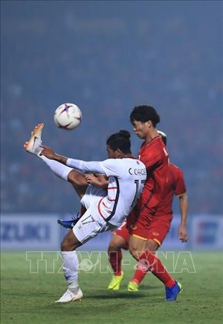 Trong ảnh: Tiền đạo Công Phượng vào sân từ băng ghế dự bị, chơi rất năng nổ ở những phút cuối trận. Ảnh: Trọng Đạt - TTXVN