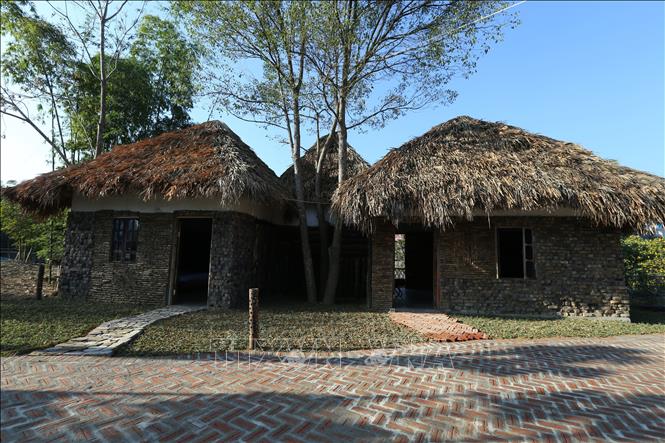Trong ảnh: Nhà cộng đồng trong khu Homestay Mường Then. Ảnh: Tuấn Anh - TTXVN