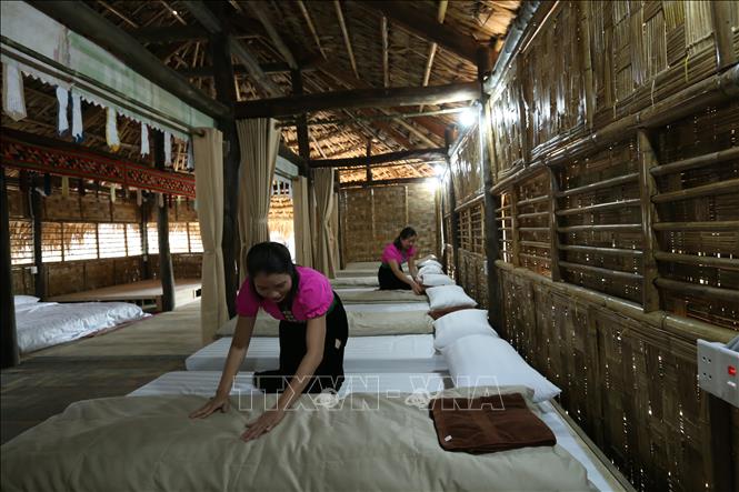 Trong ảnh: Nhà cộng đồng trong khu Homestay Mường Then.  Ảnh: Tuấn Anh - TTXVN
