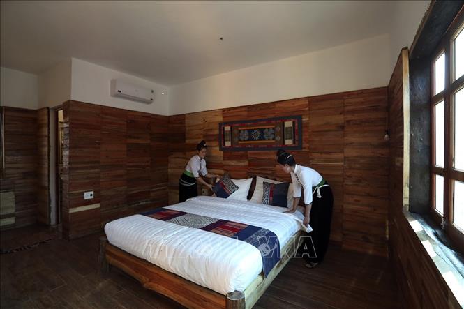 Trong ảnh: Bên trong một nhà cộng đồng tại Homestay Mường Then. Ảnh: Tuấn Anh - TTXVN