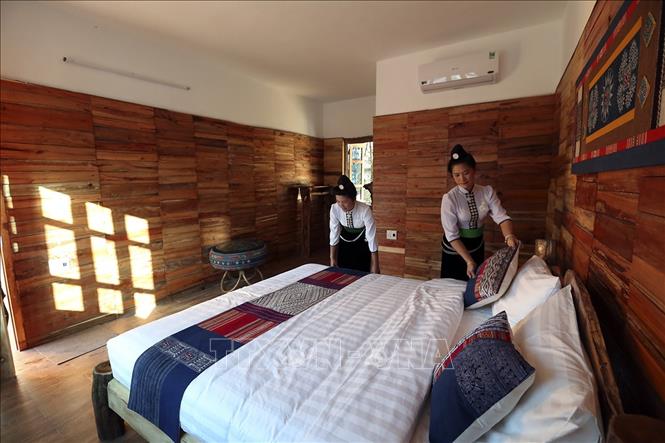 Trong ảnh: Bên trong một nhà cộng đồng tại Homestay Mường Then. Ảnh: Tuấn Anh - TTXVN