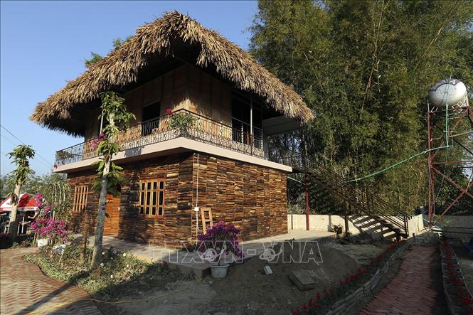 Trong ảnh: Một nhà cộng đồng tại Homestay Mường Then. Ảnh: Tuấn Anh - TTXVN