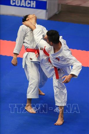 Trong ảnh: Các VĐV đoàn Ninh Bình thi đấu ở nội dung Kata (biểu diễn) đồng đội nam. Ảnh: Trọng Đạt – TTXVN