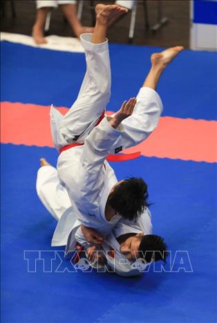 Trong ảnh: Các VĐV đoàn Ninh Bình thi đấu ở nội dung Kata (biểu diễn) đồng đội nam. Ảnh: Trọng Đạt – TTXVN