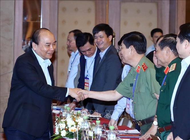 Trong ảnh: Thủ tướng Nguyễn Xuân Phúc với các đại biểu tham dự hội nghị. Ảnh: Thống Nhất – TTXVN