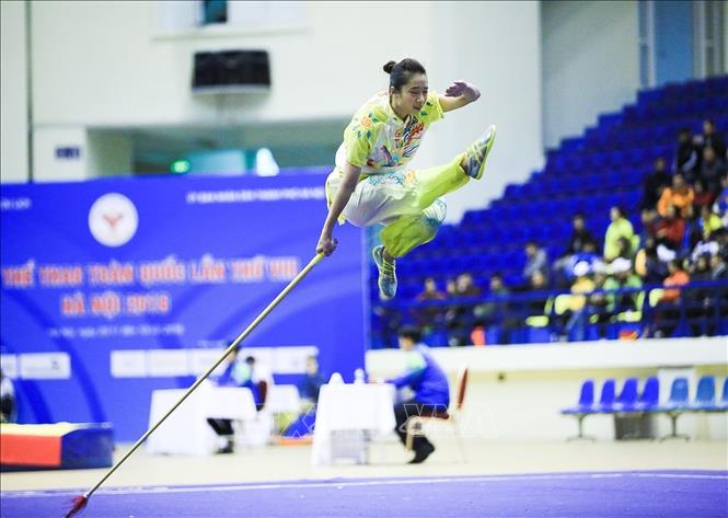Trong ảnh: Môn Wushu, VĐV Dương Thuý Vi (đoàn Hà Nội) thực hiện phần thi Taolu, nội dung Thương thuật nữ. Ảnh: Trọng Đạt – TTXVN