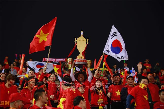 Photo: Vietnamese fans in My Dinh National Stadium. VNA Photo