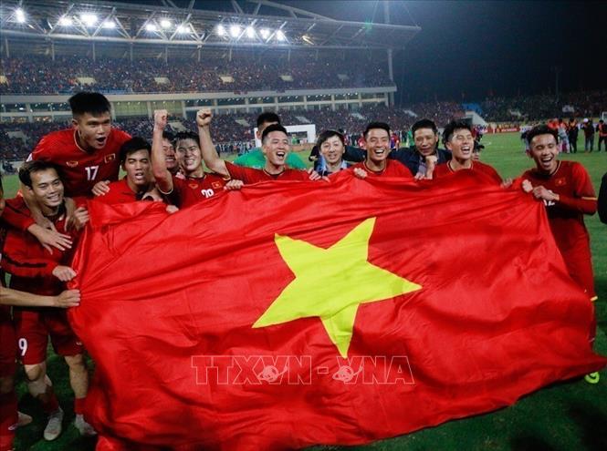Photo: Vietnamese players celebrate their victory. VNA Photo