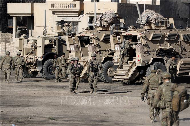 Trong ảnh (tư liệu): Binh sĩ Mỹ trong chiến dịch chống IS tại khu vực ngoại ô Mosul, Iraq ngày 23/11/2016. Ảnh: AFP/ TTXVN