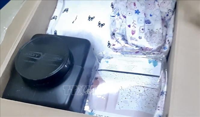 Trong ảnh: Tang vật của vụ án. Ảnh: Anh Tuấn - TTXVN