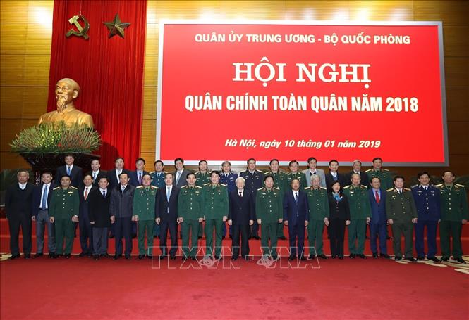 Trong ảnh : Tổng Bí thư, Chủ tịch nước Nguyễn Phú Trọng, Bí thư Quân ủy Trung ương và các đại biểu chụp ảnh chung. Ảnh: Trí Dũng – TTXVN