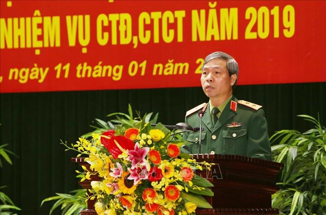 Trong ảnh: Trung tướng Đỗ Căn, Phó Chủ nhiệm Tổng cục Chính trị QĐND Việt Nam báo cáo tổng kết. Ảnh: Dương Giang – TTXVN