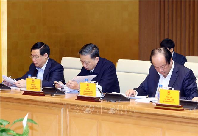 Trong ảnh: Các thành viên Tiểu ban Kinh tế - Xã hội tham dự phiên họp. Ảnh: Thống Nhất – TTXVN