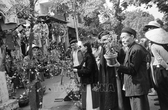 Trong ảnh: Chợ Đồng Xuân nhộn nhịp những ngày Tết đến. Ảnh: TTXVN