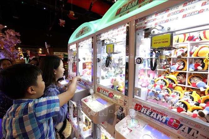 Trong ảnh: Các trò chơi thu hút giới trẻ, trẻ em tại Dream Games Center ở Aeon Mall Long Biên (ảnh chụp ngày 07/02/2019 tức mồng 3 Tết Kỷ Hợi). Ảnh: Anh Tuấn - TTXVN