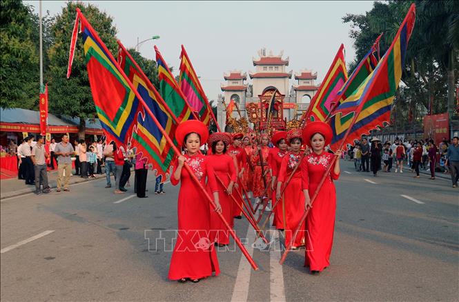 Trong ảnh: Nghi thức rước cờ tại Lễ hội đền Hai Bà Trưng xuân Kỷ Hợi 2019. Ảnh: Nguyễn Hoàng-TTXVN