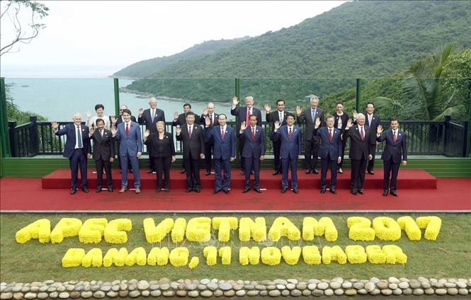 Trong ảnh: Chủ tịch nước Trần Đại Quang và các Trưởng đoàn dự Hội nghị cấp cao APEC lần thứ 25, tháng 11/2017 tại Đà Nẵng. Đây là lần thứ hai Việt Nam tổ chức thành công Hội nghị cấp cao APEC, sau lần thứ nhất diễn ra tại Hà Nội năm 2006. Ảnh: TTXVN