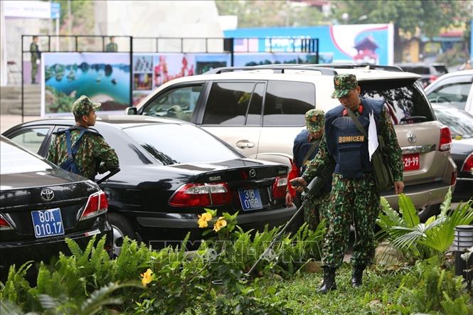 Photo: Sappers make safety checks at places where the activities within the second US-DPRK summit will take place. VNA Photo: Dương Giang 