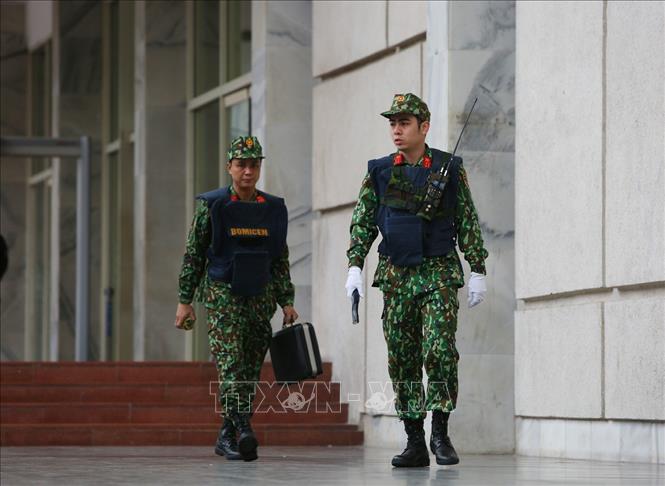 Photo: Sappers make safety checks at places where the activities within the second US-DPRK summit will take place. VNA Photo: Dương Giang 
