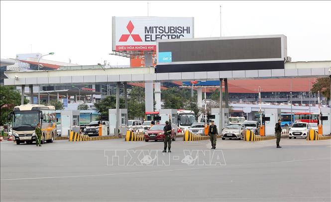 Photo: Security measures are taken at the highest level at the Noi Bai International Airport. VNA Photo: Huy Hùng