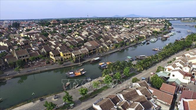Photo: A panoramic view of Hoi An ancient town. The town is on both sides of Thu Bon river’s mouth, an ideal location for merchants with trading ship in the past. VNA Photo: Minh Đức