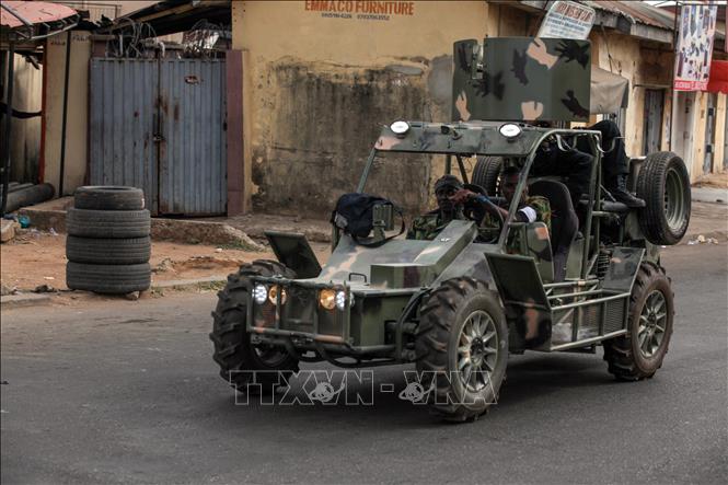 Trong ảnh: Xe quân sự tuần tra tại Kaduna, Nigeria, ngày 9/3/2019. Ảnh: AFP/ TTXVN