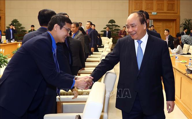 Trong ảnh: Thủ tướng Nguyễn Xuân Phúc với các đại biểu tham dự buổi làm việc. Ảnh: Thống Nhất – TTXVN