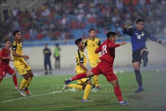 Trong ảnh: Tình huống Hà Đức Chinh ghi bàn thắng bàn thắng mở tỉ số cho Việt Nam. Ảnh: Trọng Đạt - TTXVN