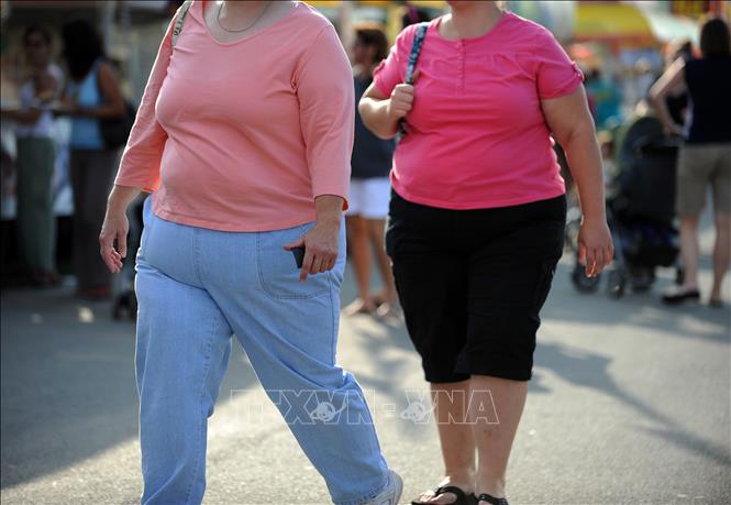 Trong ảnh: Phụ nữ bị thừa cân béo phì tại Maryland, Mỹ. Ảnh: AFP/TTXVN