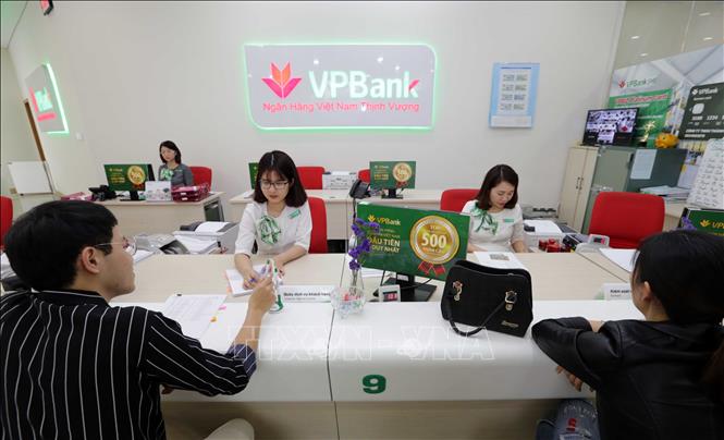 Trong ảnh: Sức mạnh thương hiệu của VPBank cũng được thể hiện mạnh mẽ ở những phân khúc chiến lược mà ngân hàng đang dẫn đầu thị trường, đó là phân khúc tài chính tiêu dùng, khách hàng cá nhân, khách hàng doanh nghiệp vừa và nhỏ và khách hàng tiểu thương. Ảnh: Trần Việt - TTXVN