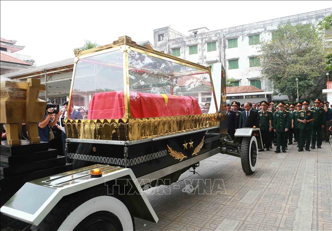 Trong ảnh: Lễ truy điệu và đưa tang đồng chí Trung tướng Đồng Sỹ Nguyên về nơi an nghỉ cuối cùng. Ảnh: Doãn Tấn - TTXVN