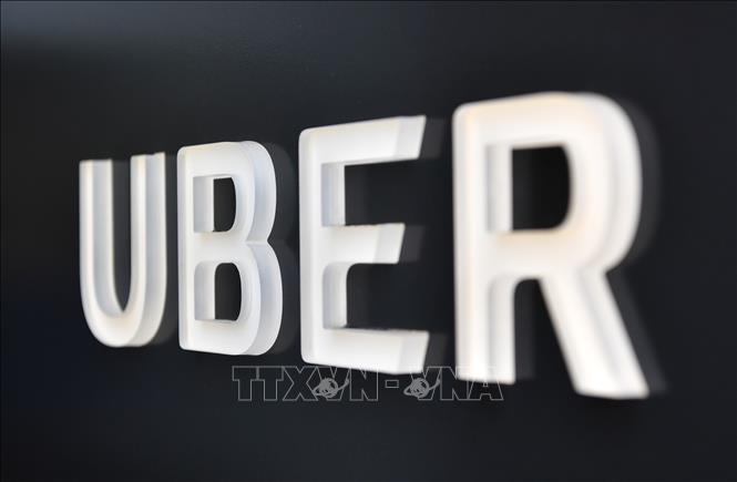 Trong ảnh (tư liệu): Biểu tượng Uber tại trụ sở ở San Francisco, California, Mỹ. Ảnh: AFP/ TTXVN