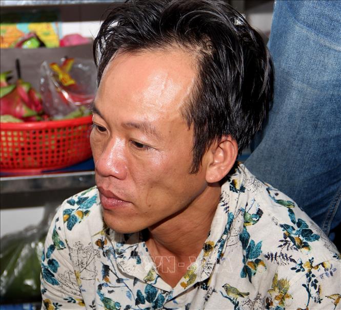 Trong ảnh: Đối tượng Nguyễn Thanh Hải (Tý, Huy) tại cơ quan điều tra. Ảnh: Công Mạo-TTXVN