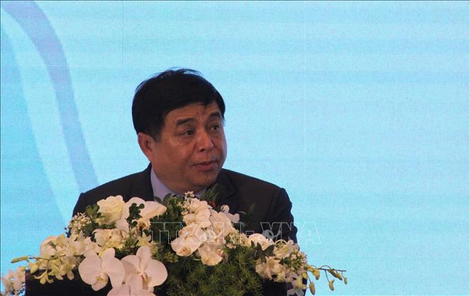 Trong ảnh: Bộ trưởng Bộ Kế hoạch và Đầu tư Nguyễn Chí Dũng phát biểu tại lễ khai mạc diễn đàn. Ảnh: Xuân Dự - TTXVN  