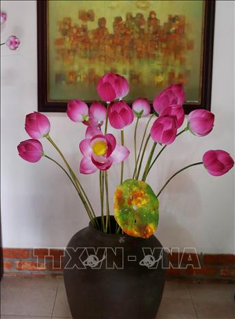 Trong ảnh: Hoa giấy Thanh Tiên đã tạo được thương hiệu trong và ngoài nước. Ảnh: Quốc Việt - TTXVN