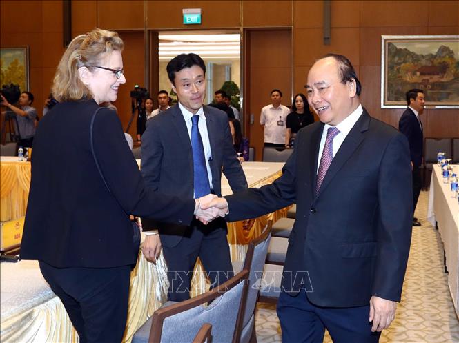 Trong ảnh: Thủ tướng Nguyễn Xuân Phúc, Trưởng Ban Chỉ đạo quốc gia về hội nhập quốc tế và các đại biểu. Ảnh: Thống Nhất – TTXVN

