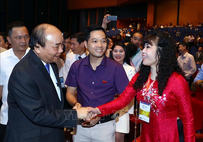 Trong ảnh: Thủ tướng Nguyễn Xuân Phúc với các đại biểu tại Diễn đàn Kinh tế tư nhân Việt Nam 2019. Ảnh: Thống Nhất – TTXVN
