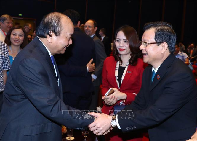 Trong ảnh: Thủ tướng Nguyễn Xuân Phúc với các đại biểu tại Diễn đàn Kinh tế tư nhân Việt Nam 2019. Ảnh: Thống Nhất – TTXVN
