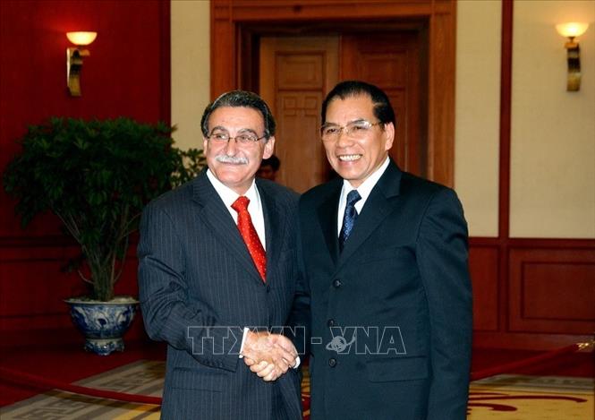 Trong ảnh: Tổng Bí thư Nông Đức Mạnh tiếp Chủ tịch Đảng Cộng sản Brazil Renato Rabelo sang thăm và làm việc tại Việt Nam, ngày 9/5/2008. Ảnh: Nguyễn Dân - TTXVN         
