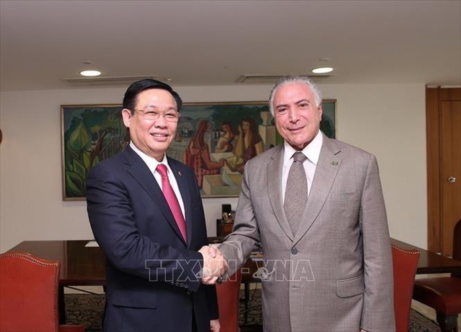 Trong ảnh: Phó Thủ tướng Vương Đình Huệ hội kiến với Tổng thống Michel Temer tại thủ đô Brasilia, trong chuyến thăm chính thức Brazil từ ngày 2 - 3/7/2018 nhằm tiếp tục duy trì và thúc đẩy quan hệ đối tác toàn diện Việt Nam - Brazil ngày càng đi vào chiều sâu. Ảnh: Hoài Nam - TTXVN