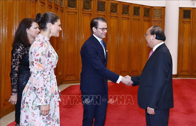 Trong ảnh: Thủ tướng Nguyễn Xuân Phúc và phu quân Daniel của Công chúa kế vị Thụy Điển Victoria Ingrid Alice Desiree đang có chuyến thăm chính thức Việt Nam.  Ảnh: Thống Nhất – TTXVN
