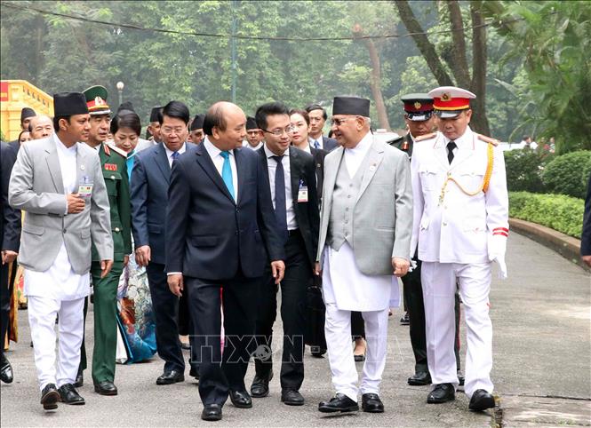 Trong ảnh: Thủ tướng Nguyễn Xuân Phúc và Thủ tướng Nepal K.P. Sharma Oli đến Trụ sở Chính phủ để hội đàm. Ảnh: Văn Điệp – TTXVN