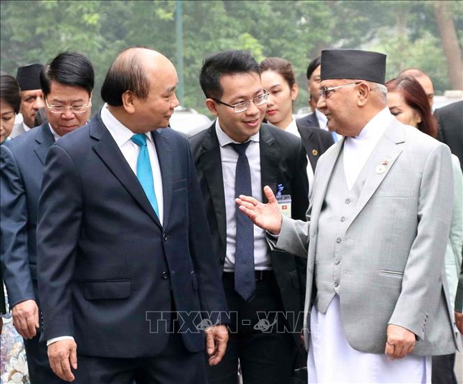 Trong ảnh: Thủ tướng Nguyễn Xuân Phúc và Thủ tướng Nepal K.P. Sharma Oli đến Trụ sở Chính phủ để hội đàm. Ảnh: Văn Điệp – TTXVN