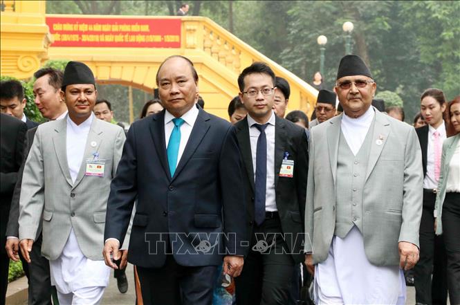 Trong ảnh: Thủ tướng Nguyễn Xuân Phúc và Thủ tướng Nepal K.P. Sharma Oli đến Trụ sở Chính phủ để hội đàm. Ảnh: Văn Điệp – TTXVN