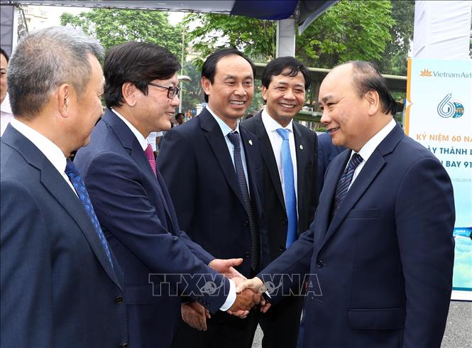 Trong ảnh: Thủ tướng Nguyễn Xuân Phúc và các đại biểu tham dự lễ kỷ niệm. Ảnh: Thống Nhất - TTXVN 