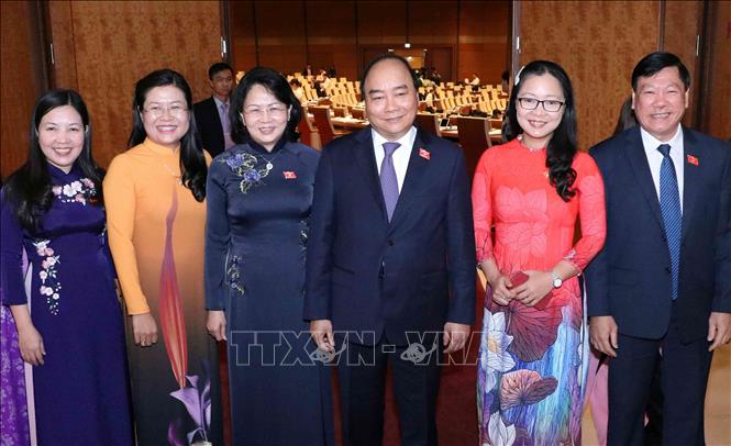 Trong ảnh: Thủ tướng Nguyễn Xuân Phúc với các đại biểu Quốc hội khóa XIV tại kỳ họp thứ bảy. Ảnh: Văn Điệp – TTXVN