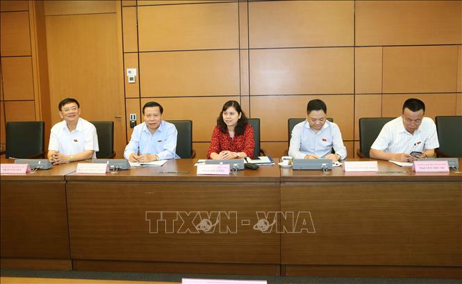 Trong ảnh: Đoàn đại biểu tỉnh Bắc Ninh thảo luận ở tổ. Ảnh: Doãn Tấn - TTXVN