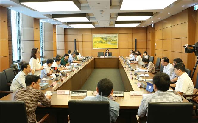 Trong ảnh: Đoàn đại biểu các tỉnh Bắc Ninh, Phú Yên, An Giang và Bạc Liêu thảo luận ở tổ. Ảnh: Doãn Tấn - TTXVN