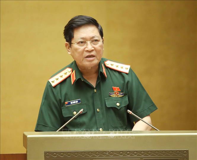 Trong ảnh: Đại tướng Ngô Xuân Lịch Bộ trưởng Bộ Quốc phòng giải trình ý kiến của đại biểu Quốc hội. Ảnh: Doãn Tấn - TTXVN